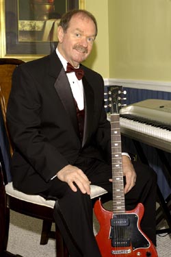 Will Roberson shown with guitar.jpg